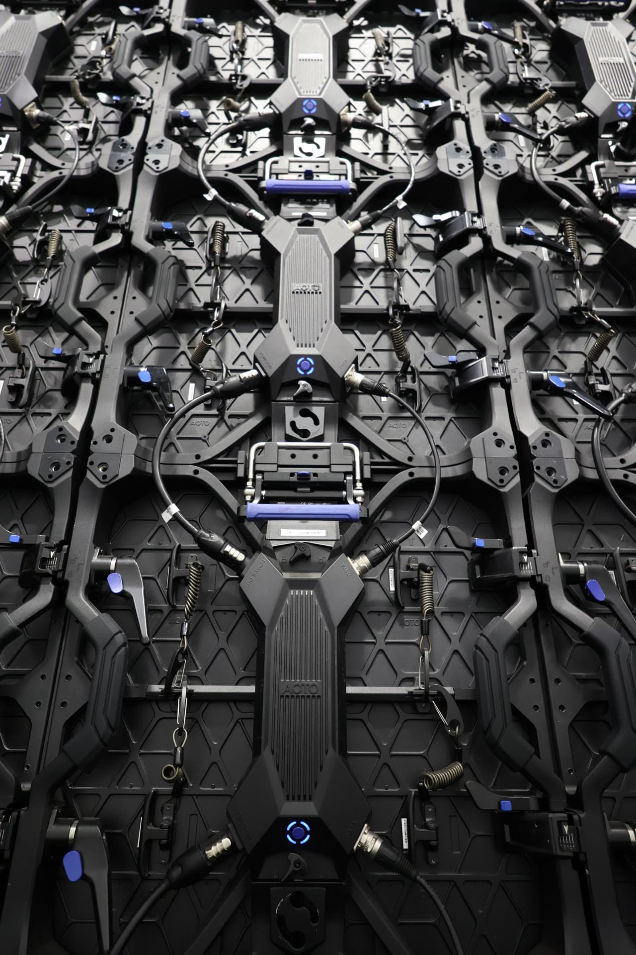 Back of AOTO LED panels showing connectors, modules, and cabling