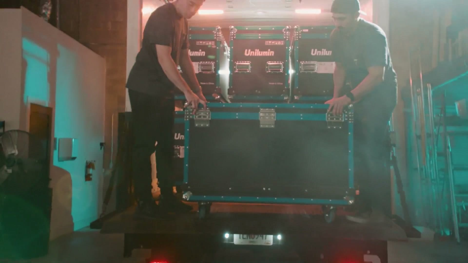 Form Volumes crew handling LED cabinets during an installation